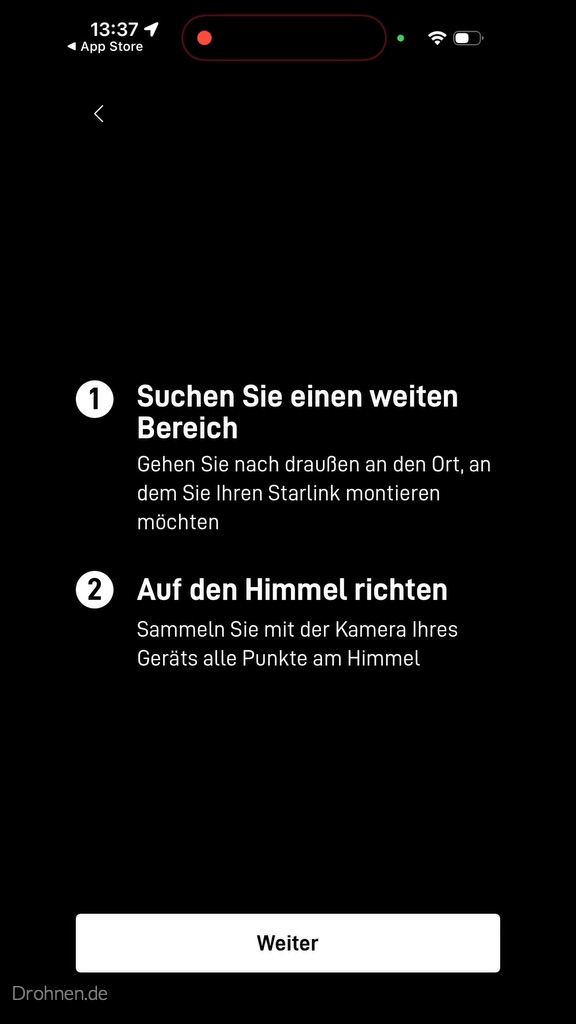 Starlink-App mit Anweisungen, einen offenen Bereich aufzusuchen und die Smartphonekamera zum Himmel zu richten.