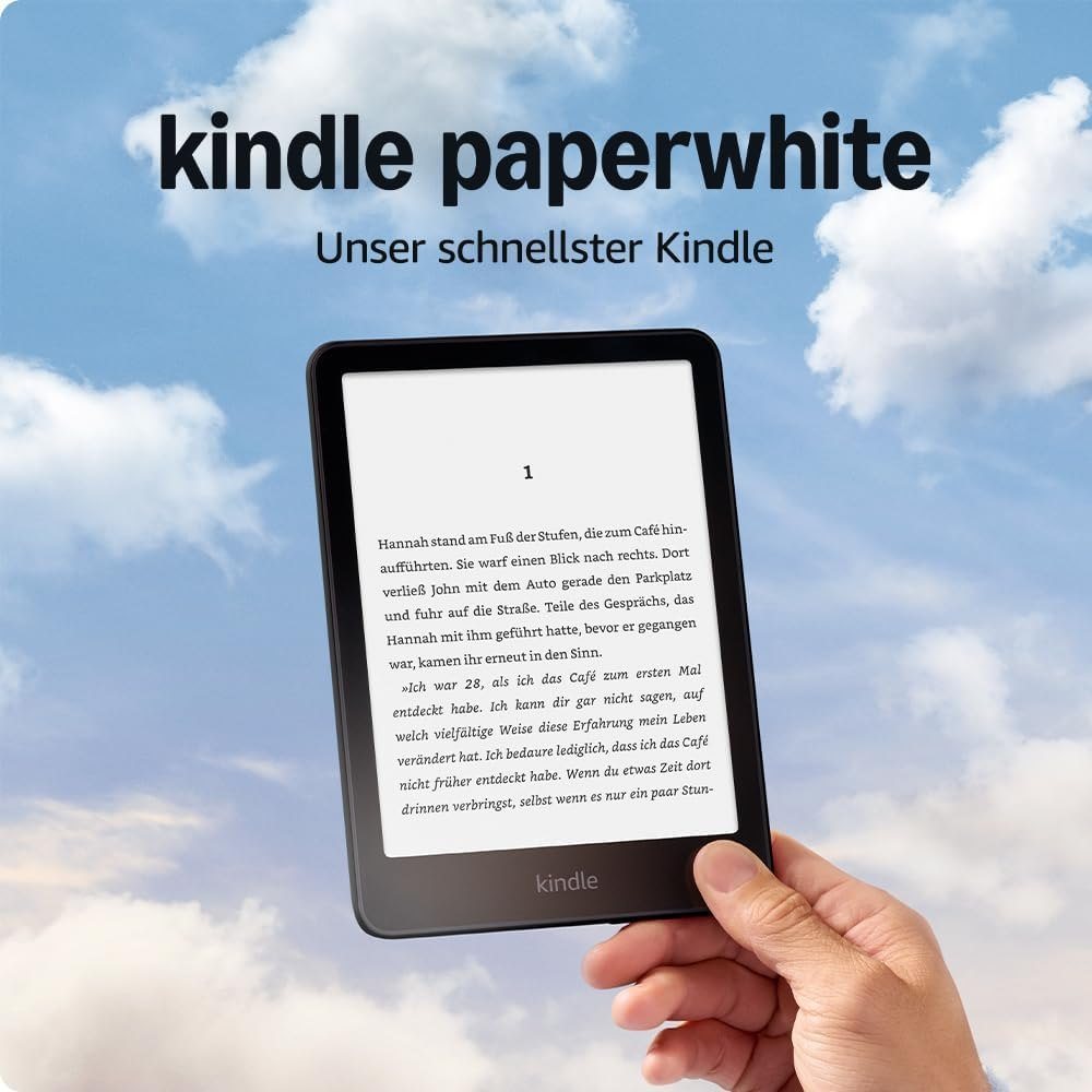 Amazon Kindle Paperwhite mit 7-Zoll-Display in einer Hand vor blauem Himmel mit Wolken