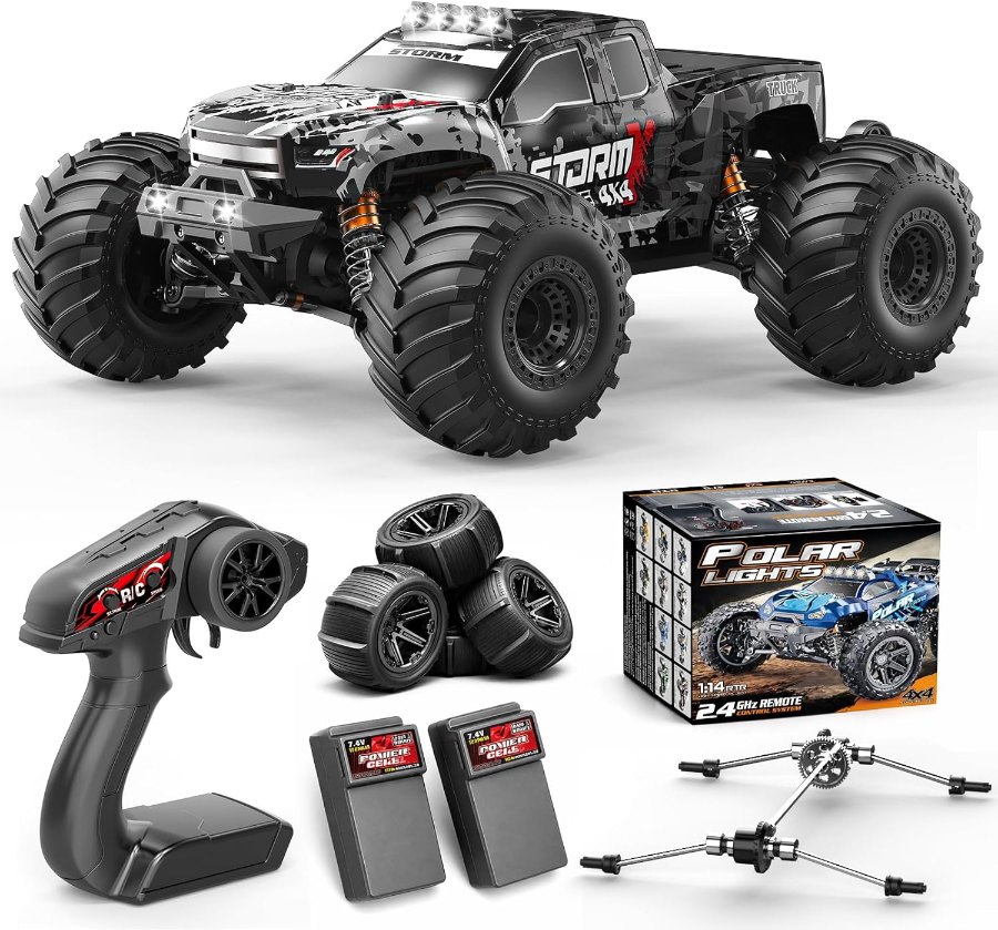 Schwarz-grauer Womaqu 1:14 RC-Monstertruck mit Dach-LEDs, Fernsteuerung, zwei Akkus und zweitem Reifensatz